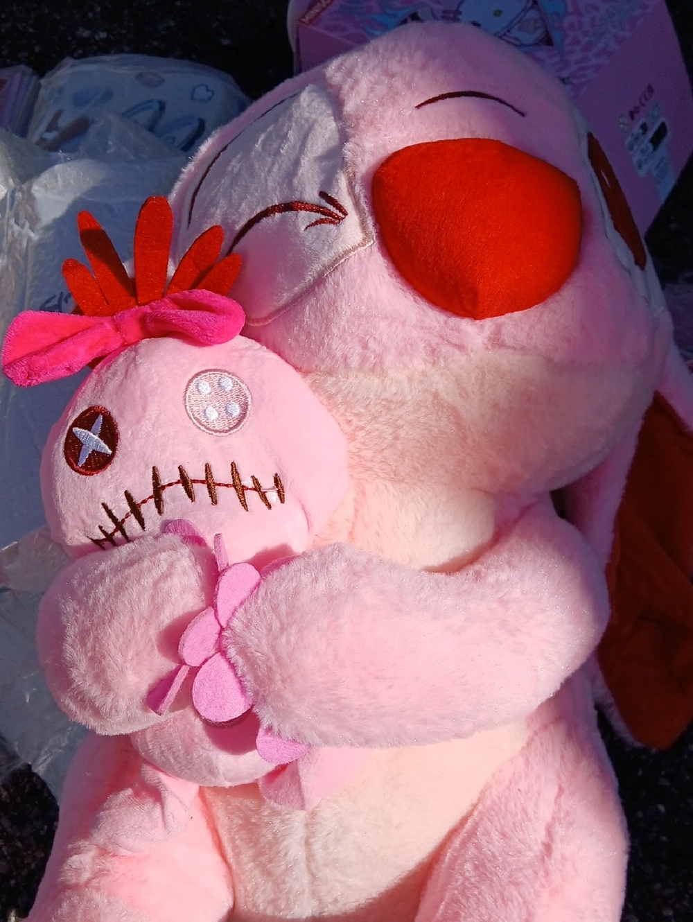Cute Pink Plush Puppy Holding Doll - Heart Patch Eyes